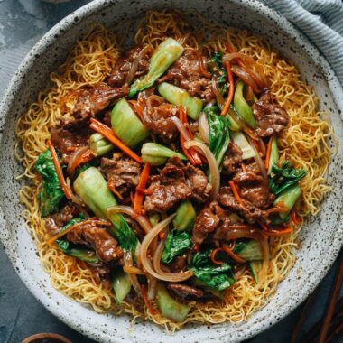 Hong Kong style beef and brown sauce over crispy noodles
