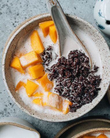 Black rice pudding with coconut milk close up